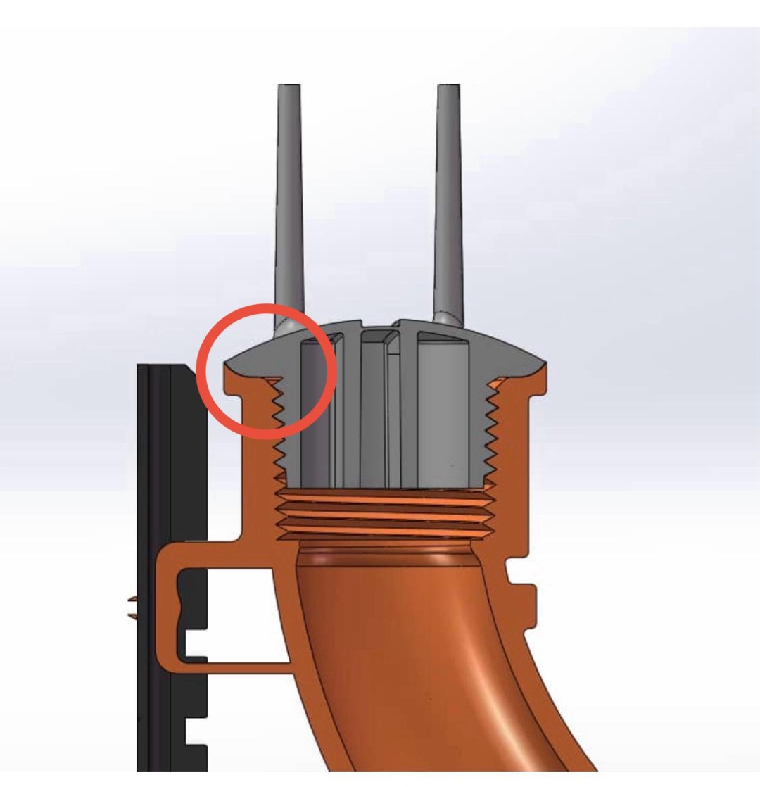 Section view — Stub-EASE II™ TPR cap seated into Bend-EASE™ flanged collar showing eased-edge gasket interface